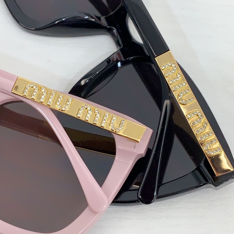 Miu miu Sunglasses